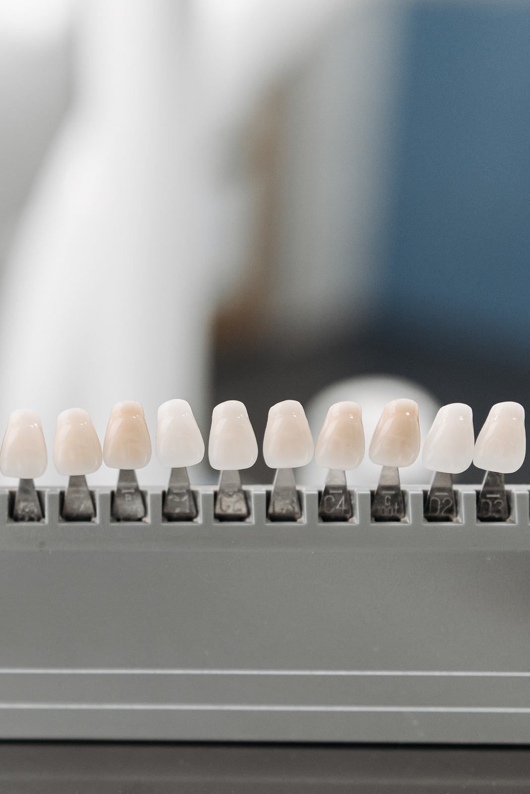 Dental shade guide used to select natural-looking veneer colours at SnapFit Dentures, Wolverhampton